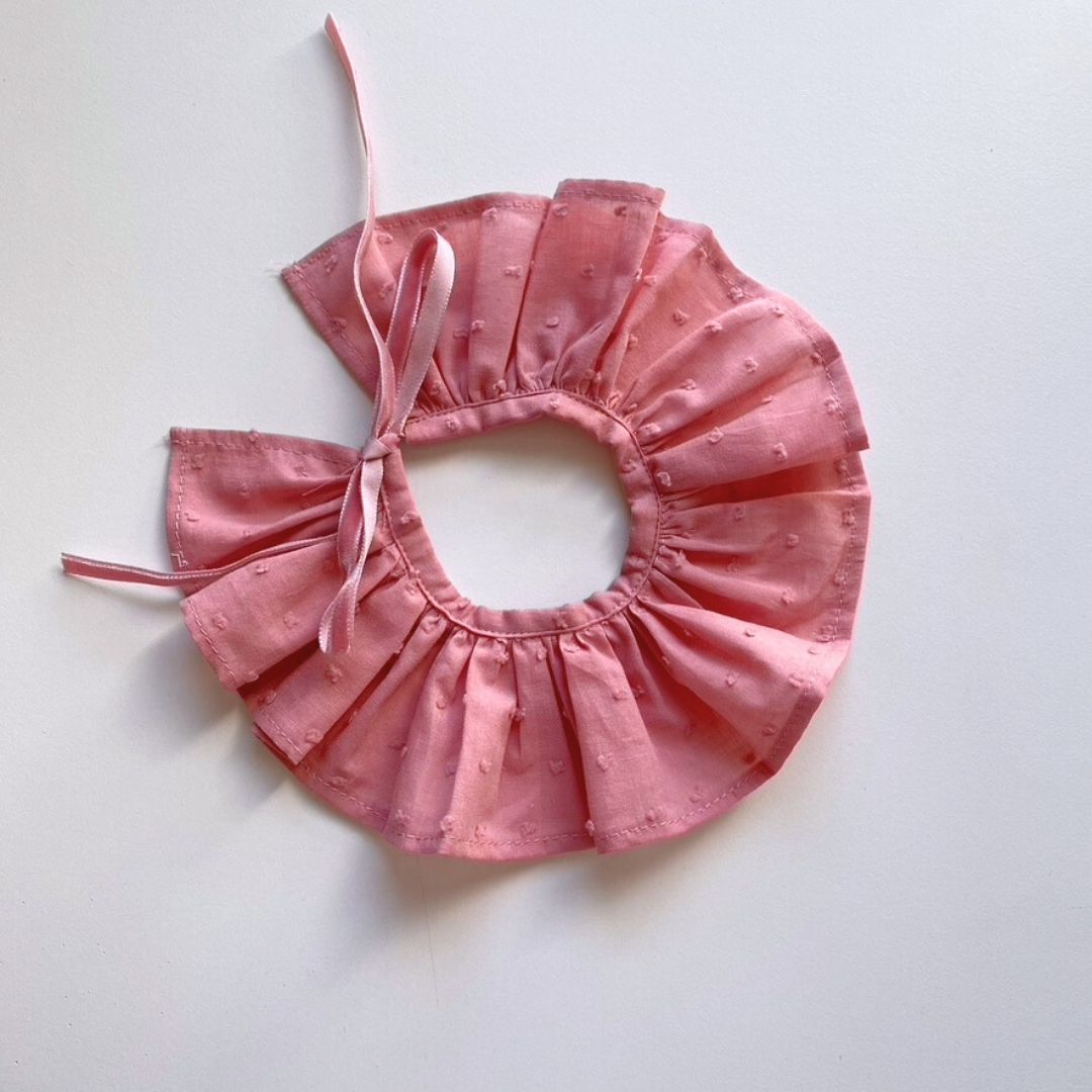 CUELLO VOLANTE PLUMETI ROSA