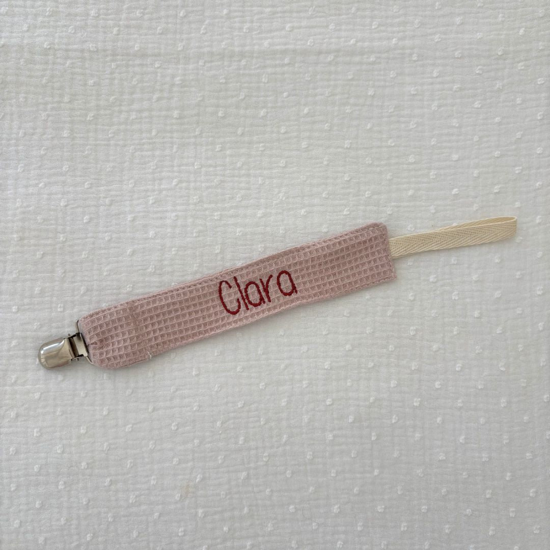 <transcy>Pacifier holder</transcy>